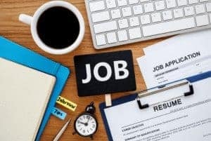 curriculum vitae, job opportunity su una scrivania